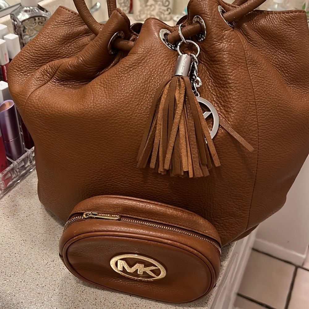 MICHAEL. KORS. 55. Good.